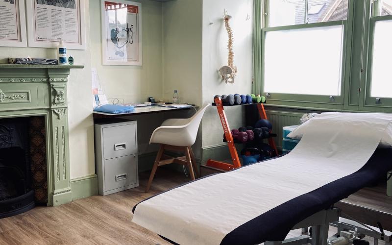 Treatment room with weights at White Hart Clinic Barnes